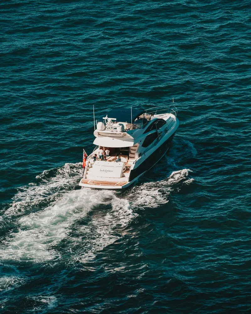 Motor yacht cruising on deep blue water
